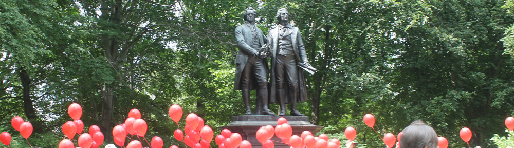 99 red balloons in German Cultural Garden in front of the Goethe-Schiller monument